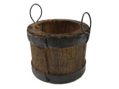 an old wooden bucket with metal handles