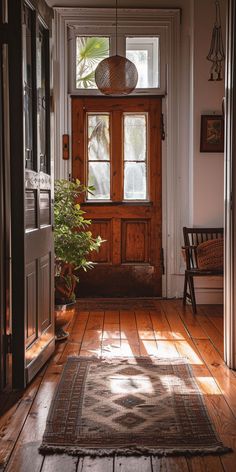 Modern farmhouse hallway with a blend of rustic wood and contemporary design Modern Farmhouse Hallway, Farmhouse Hallway Decor, Farmhouse Hallway, Rustic Entryway, Hallway Design, Warm Decor, Elegant Decor, Hallway Decorating, The Ranch