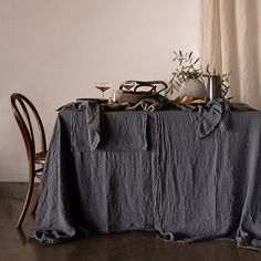 the table is covered with an old linen cloth