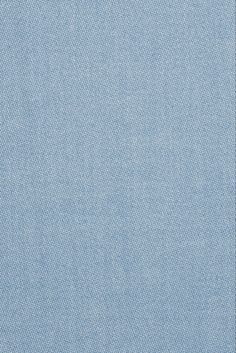 an image of a blue background that looks like it is made out of denim fabric