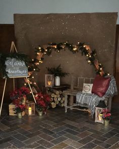 a fireplace decorated with christmas lights and decorations