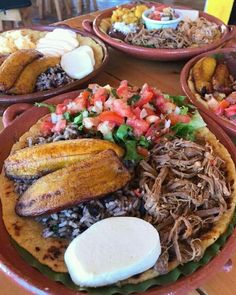 several plates filled with different types of food