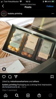 an open box containing three different types of chocolates