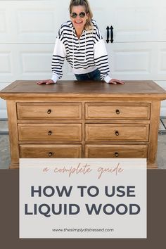 a woman sitting on top of a wooden dresser with the words how to use liquid wood