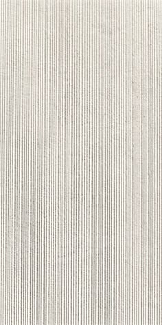 a white wall with vertical lines in the middle and one line at the bottom that is diagonally striped