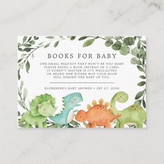 a baby shower card with dinosaurs and leaves