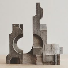 an abstract sculpture made out of concrete blocks