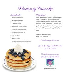 blueberry pancakes with whipped cream and blackberries are on a white plate next to the recipe