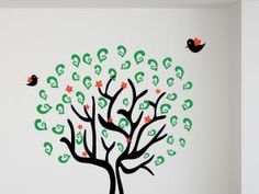 a tree with money notes on it and birds flying around the tree, in a white room