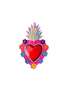 a heart shaped pin with flowers and feathers on it's side, sitting in front of a white background