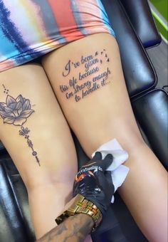 two people with tattoos on their legs and one has a tattoo saying i love you