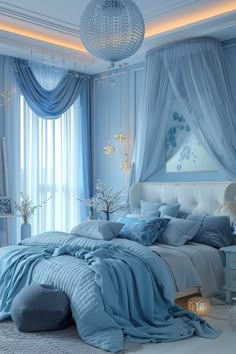 a bedroom decorated in blue and white with a chandelier hanging from the ceiling