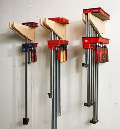 three different types of tools hanging on a wall