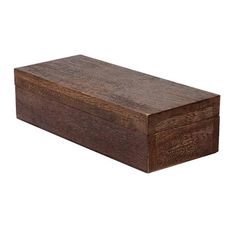 a wooden box sitting on top of a white surface