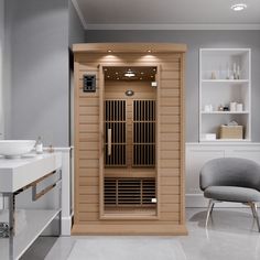 a bathroom with a large sauna in the middle and a chair next to it