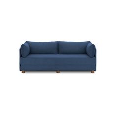 a blue couch sitting on top of a white floor