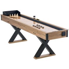 a wooden table with an electronic game set on it's legs and two pieces of wood in the middle