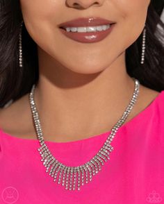 A double-stranded chain of dainty white rhinestones in silver square fittings leads the eye down to a fringe of gems in square fittings that drip in varying lengths down the collar, creating a sparkling display. Features an adjustable clasp closure. Sold as one individual choker necklace. Includes one pair of matching earrings. Square Rhinestone Necklace, White Necklace, White Rhinestone, Matching Earrings, Choker Necklace, Collar, Gems, Chain, Silver