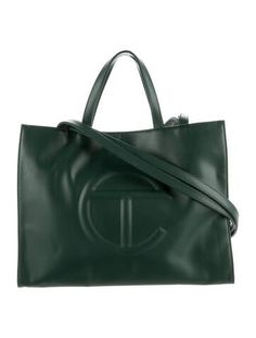 Telfar ToteGreen Vegan LeatherSilver-Tone HardwareFlat Handles & Dual Shoulder StrapsCanvas Lining & Single Interior PocketSnap Closure at TopIncludes Dust Bag Green Telfar, Telfar Bags, Vegan Leather Tote, Medium Tote, Work Bags, Shopper Tote, Shopping Tote Bag, Shopping Tote, Green Bag