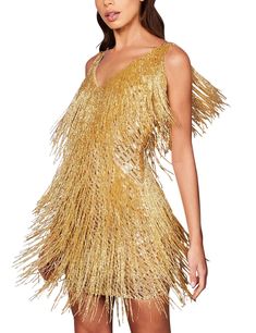 PRICES MAY VARY. The glamorous design of our sleeveless sequins dress with feather will take you from bars to parties. Cut from plush black stretch velvet, this mini dress has a simple rounded neckline and lets the dramatic feathered hem do the talking. Natural waistline, tank top design, sleeveless, and tiered horizontal rows of fringe, A fantastic, elegant and stylish mini dress, Reminiscent of the roaring '27s. Wear yours with your highest heels in black for a tonal vibe.Dry clean or hand was Fringe Mini Dress, Party Mode, Look Retro, Trendy Streetwear, Tassel Dress, Jazz Age, Purple Mini Dresses, Mini Tank Dress, Roaring Twenties