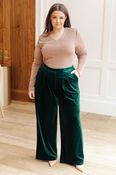 These Velvet Elvis Velvet Pants feel ultra-luxe and are guaranteed to make a bold statement. Cut from emerald velvet with a high-rise waist and wide-leg silhouette, this elegant piece is perfect for elevating any look. Wear yours to make a fashionable impression! Velvet High Rise Clasp and Button Closure Zip Fly Elastic Back Waistband Pockets Wide Leg 95% Polyester, 5% Spandex True to Size S: Waist 28" Hips 46" Rise 12" Inseam 30"M: Waist 30" Hips 48" Rise 12.5" Inseam 30"L: Waist 32" Hips 50" R Wide Leg Velvet Pants, Velvet Elvis, Business Casual Outfit Ideas, Emerald Velvet, Style Business Casual, Business Casual Outfit, Fashion Mom, Glitter Bomb, Outfit Ideas Casual