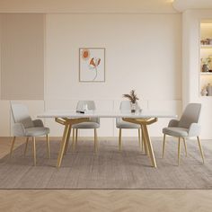 a dining room table with four chairs and a vase on the wall next to it