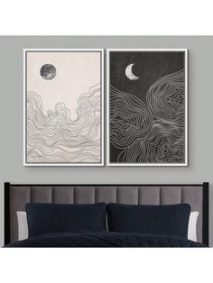 two black and white paintings hanging above a bed