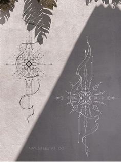 an artistic tattoo design on the side of a concrete wall with palm leaves and flowers