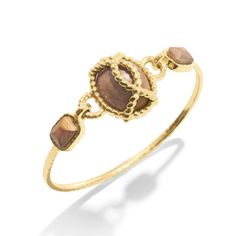 Inspired by my globe-trekking and fabulous French aunt, this classic chain bracelet personifies her effortless-yet-impeccable style that she achieves everyday. Featuring a subtly ornate gold motif complemented by earthy teak beads, this bracelet is perfect for life’s many adventures, from museum galas to mountaintop picnics. Elegant Brown Stackable Jewelry, Everyday Brown Stackable Jewelry, Everyday Stackable Brown Jewelry, Earthy Gold Jewelry For Everyday, Earthy Everyday Gold Jewelry, Adjustable Earthy Gold Jewelry, Earthy Gold Jewelry, Gold Motif, Hinged Bracelet