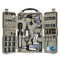 an open tool box filled with tools on top of a white surface and lots of other items in it