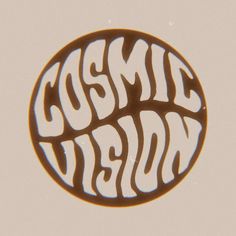 a brown and white sticker with the words cosmic dream in it's center