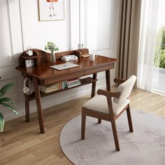 a wooden desk with a laptop on top of it next to a chair and potted plant