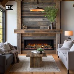 a living room filled with furniture and a fire place in front of a wooden wall