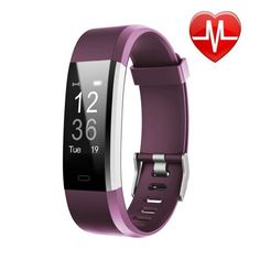 the fitbit smart watch with heart rate monitor on it's wrist and purple band