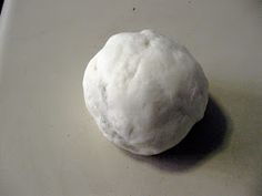 a ball of dough sitting on top of a counter