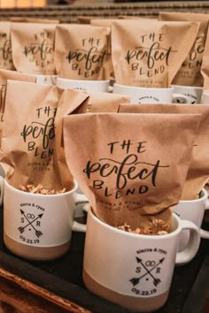 coffee bags with the words the perfect blend on them are lined up in mugs