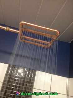 a shower head with water flowing from it