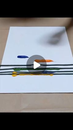 the video shows how to draw an abstract painting with colored pencils and watercolors