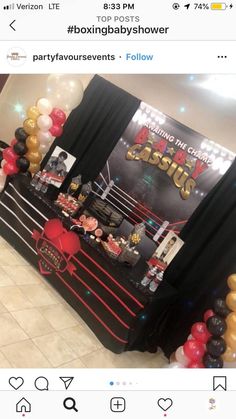 an image of a boxing themed party with balloons and streamers on the wall,