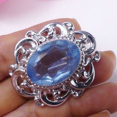 "Vintage signed Danecraft sterling silver and blue glass rhinestone pendant brooch, In good vintage condition, Measures 1\"3/4 long 1\"3/8 wide. Weighs 19.7 gram. Thanks." Elegant Oval Blue Brooches, Elegant Blue Oval Brooches, Blue Hallmarked Brooches For Anniversary, Collectible Hallmarked Blue Brooches, Elegant Blue Gemstone Brooches, Elegant Blue Gemstone Brooch, Vintage Silver Brooch With Gemstone, Vintage Silver Gemstone Brooch, Blue Oval Brooch For Gifts