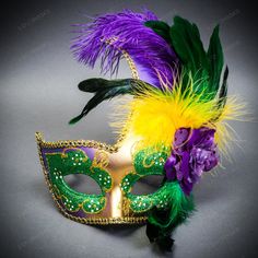 Product Description: Step Into A World Of Opulent Mystery With The Gold Venetian Half Moon Glitter Women's Masquerade Mask, Adorned With A Side Green Yellow Feather. This Mask Is A Masterpiece Of Elegance And Drama, Perfect For The Discerning Woman Who Wants To Make A Stunning Entrance At Any Masquerade Event. Crafted With A Delicate Half-Moon Shape, This Mask Sparkles In Gold Glitter, And Colorful Feather Casting A Radiant Glow That Beautifully Complements The Feminine Features. Its Design Is B Best Masquerade Mask, Mardi Gras Mask Painting, Green Masks For Mardi Gras Carnival, Multicolor Eye Mask For Mardi Gras, Multicolor Masks For Mardi Gras Party, Multicolor Mardi Gras Party Masks, Moon Masquerade, Masquerade Event, Feminine Features