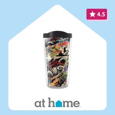 thermos tumbler cup is full of stickers and has an image of comic characters on it