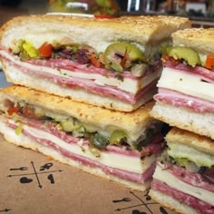 four sandwiches stacked on top of each other