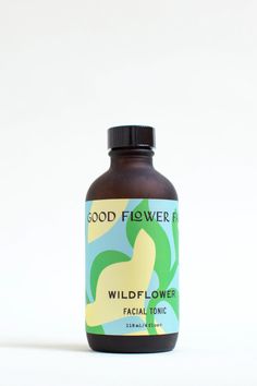 a bottle of wildflower facial tonic on a white background