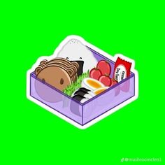 an open box filled with food on top of a green background