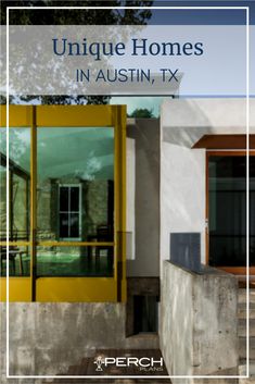 the front entrance to a house with yellow doors