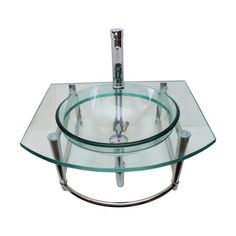 a glass table with two metal legs and a bowl on the top that has been placed in front of it