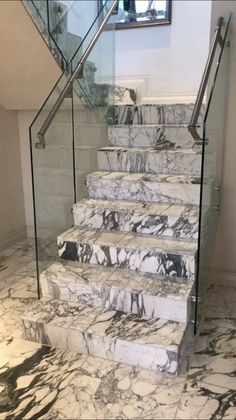 marble stairs leading up to the second floor