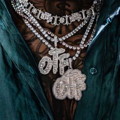 Introducing the GLD x Lil Durk exclusive collaboration- the ‘Only the Family’ Collection. This exclusive pendant is thoughtfully designed to celebrate the Grammy-award winning artist’s presence in rap culture, deeply embedded in music and style. The OTF Paint Logo Pendant is fully iced out with diamond baguette hand-set stones featuring letters with a Rose Gold border, representing family unity. Pair this piece with the 5mm Diamond Tennis Chain for a set that is guaranteed to inspire and shine. Otf Logo, Rap Culture, Paint Logo, Family Unity, Diamond Baguette, Lil Durk, Tennis Chain, Baguette Diamonds, Gold Border