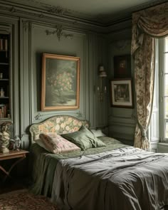 a bed in a room with green walls and curtains